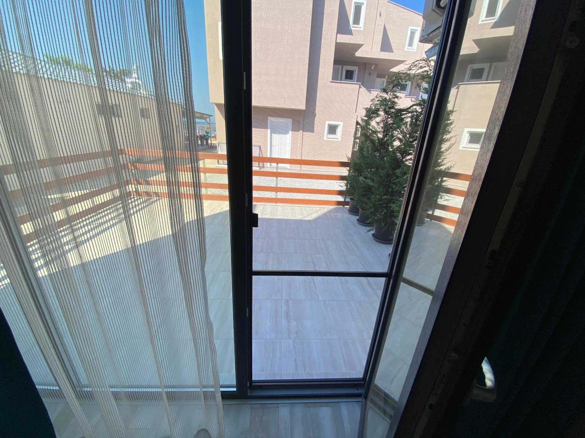 Opalium Beach Front Suites Potos Exterior foto